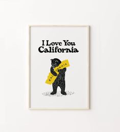 a black bear holding a yellow sign that says i love you california on the front