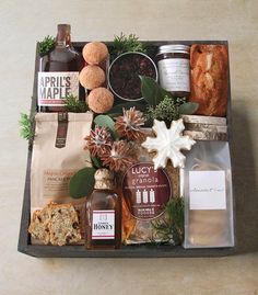 an assortment of food and drinks in a tray