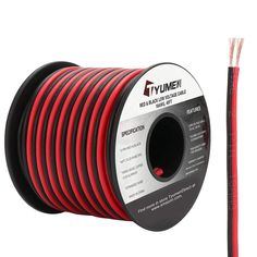 the red and black cable is being held by a wire