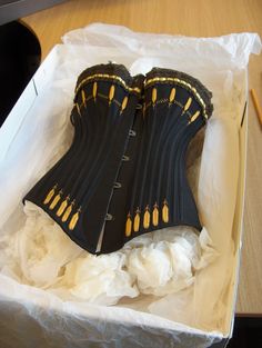 Victorian corset from the Symington collectionwith external boning channels and beautiful yellow flossing© Leicestershire County Council Museum Service Corset Flossing, Feather Corset, Edwardian Corsets, Corsets Vintage, Victorian Corset, Corset Costumes, Textile Museum, Steampunk Corset