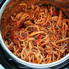 spaghetti is cooked in the crock pot and ready to be put into the slow cooker