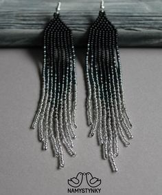 These black gray and silver seed bead earrings are made of high-quality Czech beads and strong synthetic thread. They are elegant, fashionable, and highly versatile, suitable for everyday wear. Features: Sterling silver components Color: black, gray, silver. This item is currently in stock. You must be completely satisfied. If you find merchandise unsatisfactory for any reason, return it within 10 days and your money will be refunded without questions. More beaded earrings http://etsy.me/2ycItdb Gray Chandelier, Artistic Earrings, Monet Earrings, Beige Earrings, Evening Earrings, Animal Print Earrings, Ombre Earrings, Grey Beads, Earrings Black