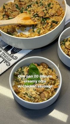 three white bowls filled with food on top of a table