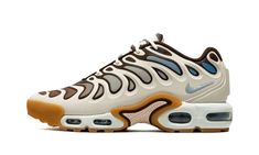 The Nike Air Max Plus Drift "Phantom/Cacao Wow" is a lifestyle shoe based on the classic Nike Air Max Plus model.  The Air Max Plus Drift was introduced in 2024 and is an evolution of the Air Max Plus, as the shoe has the same wavy overlay panels, but with a substantially bolder look.  A combination of Phantom, Light Armory Blue, Cacao Wow, Sail, and Gum Yellow hues appear throughout the design, with a gradient effect for the colors of the mesh base.  Underfoot, the sole unit is mostly identical Brown Sneakers With Air Max Cushioning For Outdoor, Brown Custom Sneakers With Boost Midsole For Outdoor, Nike Brown Sneakers For Outdoor, Brown Low-top Custom Sneakers For Outdoor, Brown Lace-up Sneakers With Air Cushioning, Brown Low-top Sneakers With Air Cushioning, Brown Casual Sneakers With Air Cushioning, Brown Sneakers With Air Cushioning For Streetwear, Casual Brown Sneakers With Air Cushioning