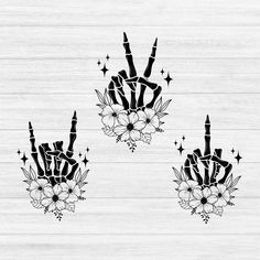 three black and white silhouettes with flowers on them, one in the shape of a hand