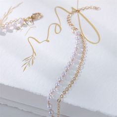 Vienkim 2022 New Double Layer Chain Gold Color Choker Necklace Women Korean Style Pearl Pendant Necklace Fashion Jewelry CollarModel Number:4001119400845 Pearl White Metal Chain Necklace, White Double Chain Jewelry For Party, Elegant Double Chain Alloy Necklace, Elegant Alloy Chain Pearl Necklace, Elegant Alloy Chain Necklace With Pearl Chain, Elegant Alloy Pearl Chain Necklace, Elegant Alloy Pearl Necklace With Chain, Elegant Pearl Necklace With Alloy Chain, White Pearl Necklace With Delicate Metal Chain