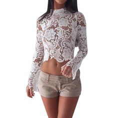 This lovely lace cropped top is both sweet and sexy. Featuring a mock turtleneck and flare sleeves this top pairs perfectly with shorts, skirts, pants, jeans or leggings. Made with a polyester and and spandex blend for comfort and style. Casual Lace Top, Leather Look Jeans, Crochet Lace Blouse, 2022 Graduation, Crop Top Women, Blouse Plus Size, Ladies Blouse, Loose Shirt, Tops Long Sleeve