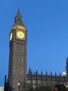 the big ben clock tower towering over the city of london