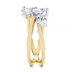 105214 14k Yellow and White Gold Ring   2 Marquise Diamonds - .24 ctw    5 Pear Diamonds - .73 ctw    2 Diamonds - .18 ctw   Clarity: VS2 - Color: F-G   Joseph Jewelry. This lovely two-tone fashion ring features several diamonds cluster set in white gold set upon a split shank yellow gold band. It was created for a client from Issaquah, WA, who had some diamonds they wanted to reset into a new unique piece. Design Your Own Engagement Ring      Our designers created a few different designs based Three Stone Cluster Diamond Ring, Cluster Diamond Ring, White Gold Set, Yellow Gold Engagement, Yellow Gold Engagement Rings, Split Shank, Marquise Diamond, Pear Diamond, Fashion Ring