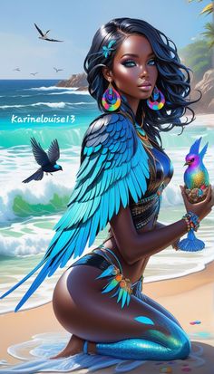 a beautiful woman sitting on top of a beach next to the ocean holding a bird