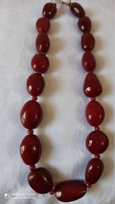 Supernatural 624 Ct Fine Quality Ruby Smooth oval Gemstone Necklace Stone : Ruby dyed Shape :- Smooth oval Necklace - 18 inch Size :- 16x22mm to 15x26mm Weight :- 624 carat Polish :- Handmade color - Red makes a great gift for your loved ones. Click below to see live stock: https://www.etsy.com/au/shop/ShakugemsStore?ref=search_shop_redirect If for any reason you are not satisfied with your purchase. You can return it for a full refund within 5 days (If you want maximum or minimum quantity of th Formal Oval Necklace With Polished Beads, Oval Gemstone Beads Necklaces For Formal Occasions, Formal Oval Gemstone Beads Necklaces, Formal Oval Gemstone Beads Necklace, Oval Necklace With Natural Stones For Formal Occasions, Classic Formal Necklace With Oval Beads, Classic Oval Bead Necklace For Formal Occasions, Oval Bead Gemstone Necklace For Formal Events, Formal Gemstone Necklace With Oval Beads