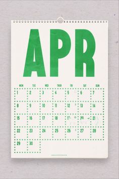 a green and white calendar with the word apr on it's front cover