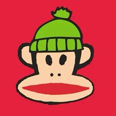 a drawing of a monkey wearing a green knitted hat with a red shirt underneath