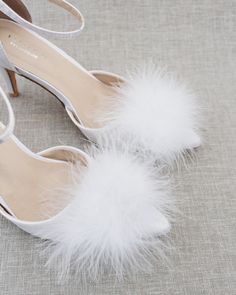 This satin pointy toe heels will give a distinguished look with accented faux fur on vamp. It completes the elegance and boldness in one. DETAILS: HEELS: 3 inches COLORS AVAILABLE: Champagne, Ivory and White UPPER: Synthetic upper and lining MATERIALS: Mandmade outsole ORIGIN: Imported STYLE NAME: BELL Faux Fur Wedding, Bridesmaids Shoes, Wedding Fur, Pointy Toe Heels, Bridal Heels, Bridesmaid Shoes, Evening Shoes, Pointed Toe Flats, Bridal Shoes