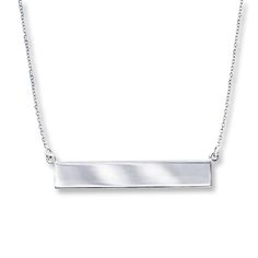 Sleek and stylish, this name plate bar necklace is styled in 14K white gold. The necklace is suspended from a cable chain that adjusts from 16 to 18 inches and secures with a lobster clasp. Diamond Bar Necklace, Diamond Choker Necklace, Jewelry Advice, White Gold Necklace, Heart Necklace Diamond, Diamond Choker, Diamond Solitaire Necklace, Gold Name Necklace, Necklace Diamond