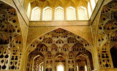 the inside of an ornate building with many windows