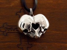 If you are a buyer from outside the EU, please add the phone number for DHL Material : sterling silver 925 SKULL HEART Colour : oxidant , ring hammered half polished Weight : 22 g ( WITH LEATHER ) Sizes : to order Width : 32 mm PROTECTED BY COPYRIGHT Unique jewellery, artistic - AUTHOR'S WORK Made to order only Sterling Silver Skull Jewelry With Polished Finish, Skull Shaped Symbolic Jewelry Stamped 925, Symbolic Skull Shaped 925 Stamped Jewelry, Unique Skull-shaped Sterling Silver Jewelry, Sterling Silver Skull Ring Gift, Gift Skull Ring Stamped 925, Skull Shaped 925 Silver Ring Gift, 925 Silver Skull Ring Gift, Gargoyle Ring