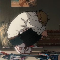 an anime character kneeling down with his head in his hands