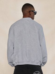 Style:Casual \nFit Type:Oversized \nDetails:Pocket \nType:Pullovers \nSleeve Type:Drop Shoulder \nNeckline:Round Neck \nColor:Grey \nPattern Type:Letter \nPattern Type:Plain \nSleeve Length:Long Sleeve \nLength:Regular \nFabric:Slight Stretch \nMaterial:Knitted Fabric \nComposition:100% Polyester \nCare Instructions:Machine wash, do not dry clean \nTemperature:Spring/Fall (18-25℃/63-77℉) \nBody:Unlined \nLined For Added Warmth:No \nSheer:No \n Men Sweatshirts, Vintage Sweatshirt, Spring And Fall, Drop Shoulder, Mens Sweatshirts, Style Casual, Knitted Fabric, Round Neck, Dry Clean