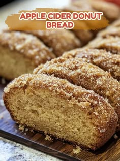 sliced apple cider donut bread on a cutting board with the words, apple cider donut bread