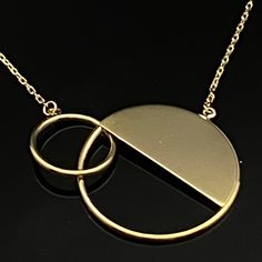 Solid 14k Yellow Gold Round Geometric Circle Pendant Chain Necklace-17" Excellent Workmanship Circle Size(S): 21.5mm & 11.5mm Chain Length: 17 Inches Weight: 2.40 Grams Metal: Solid 14k Real Gold Hallmark: 14k Very Secure Spring Ring Clasp The Necklace Will Come In Beautiful Jewelry Gift Box. Please Contact Us If You Have Any Questions. Fast; Free & Secure Shipping. N266-17 91157 Modern Gold Necklaces For Anniversary, Modern Hallmarked Yellow Gold Necklace, Gold Open Circle Jewelry For Formal Occasions, 14k Yellow Gold Open Circle Necklace, 14k Yellow Gold Full Circle Necklace, Modern Gold Open Circle Necklace, Modern Yellow Gold Open Circle Necklace, Formal Full Circle Yellow Gold Jewelry, Gold Circular Necklace With Polished Finish