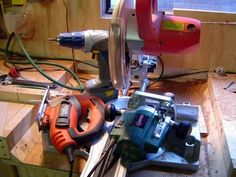 some tools are sitting on top of a workbench in the process of being made