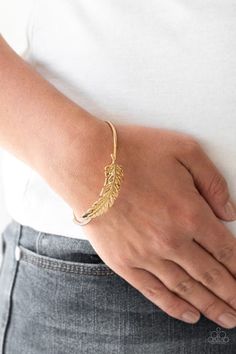 Featuring life-like detail, a shimmery gold feather folds along a dainty silver cuff for a seasonal look. Sold as one individual bracelet. Paparazzi Jewelry Images, Paparazzi Accessories Jewelry, Feather Bracelet, Gold Feathers, Copper Cuff, Gold Bracelet Cuff, Feather Design, Gold Cuffs, Paparazzi Accessories