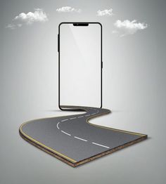 an empty cell phone sitting on top of a road with a cloud in the sky