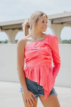 One shoulder hot pink top.Syd is wearing a size smallRuffled hemSmocked backSize Chart:Small: Bust: 34 in.Medium: Bust: 36 in.Large: Bust: 38 in.This item is final sale. Hot Pink Top, Preppy Tops, Hey Babe, Boutique Gifts, Hot Pink Tops, Gift Boutique, Pink Top, Pink Tops, Senior Pictures