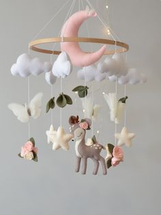 a mobile that has some animals hanging from it