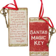 two key tags that say santa's magic key