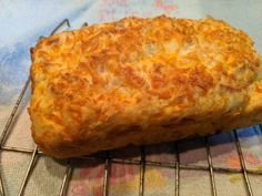 a piece of bread sitting on top of a cooling rack