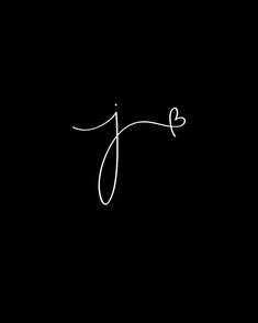 the word joy written in white ink on a black background with a small heart at the bottom