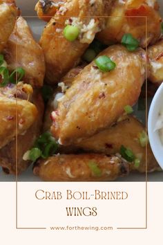 the ingredients for crab boil - brined wings in a white dish with text overlay