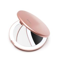 an image of a compact mirror on a white background