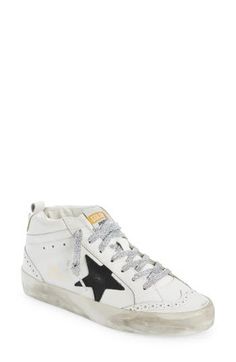 Signature scuffed-up detailing accentuates the sparkly laces of a leather sneaker punctuated with perforated eyelets. Lace-up style Leather upper and lining/rubber sole Made in Italy Women's Designer Shoes Golden Goose Mid Star, Golden Goose Mid, Sole Sneakers, Star Sneakers, Footwear Design Women, Fabric Gift Bags, Dream Shoes, Golden Goose, Golden Goose Sneaker