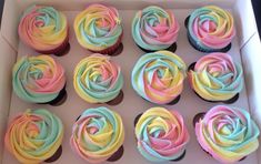 cupcakes with colorful frosting in a box