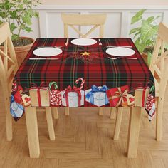 a christmas table cloth with presents on it