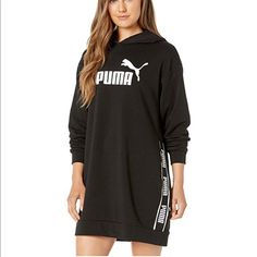 Turn Up The Comfort With The Cute, Casual, And Sporty Puma Amplified Dress Tr. Relaxed Fit Sweater Dress Features An Attached Jersey-Lined Hood And Ribbed Trim At The Cuffs And Hem. Soft Cotton-Poly Blend With A Contrast Puma Wordmark Across The Chest And Repeat Branding Along The Sides. Long Sleeves. Straight Hemline. Main: 68% Cotton, 32% Polyester; Hood Lining: 100% Cotton. Measurements: Length: 33 In Chest Measurement: 40 In Sleeve Length: 33 In Sporty Long Sleeve Dress, Pink Cropped Hoodie, Puma Sweatshirt, Large Sweaters, Sports Hoodies, Puma Women, Black Zip Ups, Lifestyle Clothing, Womens Fleece