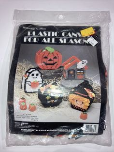 the plastic bag is filled with halloween decorations