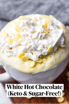 a white hot chocolate with whipped cream on top