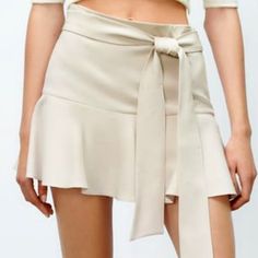 Brand New Skort In Tan Color, From Zara, In An Xs. Elegant Spring Bottoms With Tie Waist, Elegant Fitted Shorts For Spring, Chic Tie Waist Mini Bottoms, Chic Mini-length Bottoms With Tie Waist, Chic Mini Length Bottoms With Tie Waist, Elegant Mini Shorts For Spring, Elegant Mini Length Shorts For Spring, Elegant Stretch Shorts For Spring, Beige Fitted Shorts For Party