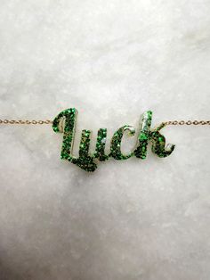 Introducing our enchanting 'Resin Luck Charm Necklace,' where luck meets elegance in a shimmering display of green and gold. The centerpiece of this adjustable length necklace is a beautifully crafted luck charm, delicately molded from resin and adorned with captivating green and gold sparkles. Each glance captures the essence of fortune, making this necklace a timeless accessory for those seeking a touch of luck and charm in their everyday style. Whether worn alone or layered with other pieces, Green Jewelry With Adjustable Chain For Party, Green Adjustable Chain Jewelry For Party, Green Pendant Charm Necklace For May Birthstone, Adjustable Gold Necklace For Good Luck, Green Jewelry For Good Luck, May Birthstone, Green Emerald Necklace With Adjustable Chain, Emerald Jewelry With Adjustable Green Chain, Green Emerald Jewelry With Adjustable Chain, Gold Jewelry For St. Patrick's Day Gift