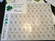 several cards with numbers and shamrocks on them sitting on top of a table next to other items