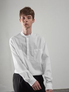 - Half button pullover shirt- China collar- Cotton blend- Comfortable fit - Long length sleeves- Oversized fit- Concealed button placket Measurement(in.)M - Length:29.9”, Shoulder width:20.8”, Chest width:22.8”, Sleeve length :25.2”L  - Length:30.3”, Shoulder width:21.6”, Chest width:24”, Sleeve length :25.6”* Model Info - Height :6’1”, Bust:31.5”, Waist:27.1”, Hips:36.2”, Large size                   Composition & Care- Outshe White Stand Collar Shirt With Button Closure, Casual White Blouse With Stand Collar, White Tops With Fold Down Collar For Daywear, White Stand Collar Top For Work, Casual White Top With Fold Down Collar, Casual White Dress Shirt For Fall, White Relaxed Fit Blouse With Placket, Classic Tops With Button Cuffs And Stand Collar, White Dress Shirt With Pockets For Work