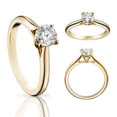 two gold engagement rings, one with a diamond and the other with a single stone