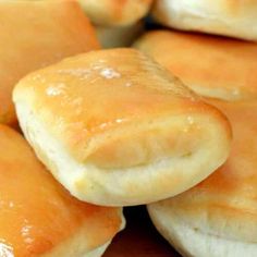 close up view of bread rolls with butter on them