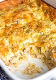 a casserole dish filled with chicken and cheese