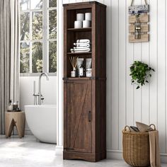 a tall wooden cabinet sitting next to a bath tub in a room with white walls