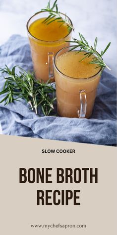 two glasses filled with bone broth and garnished with rosemary